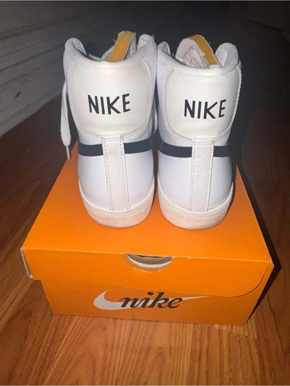 Nike Blazer Mid '77 white sneakers with black Nike swoosh